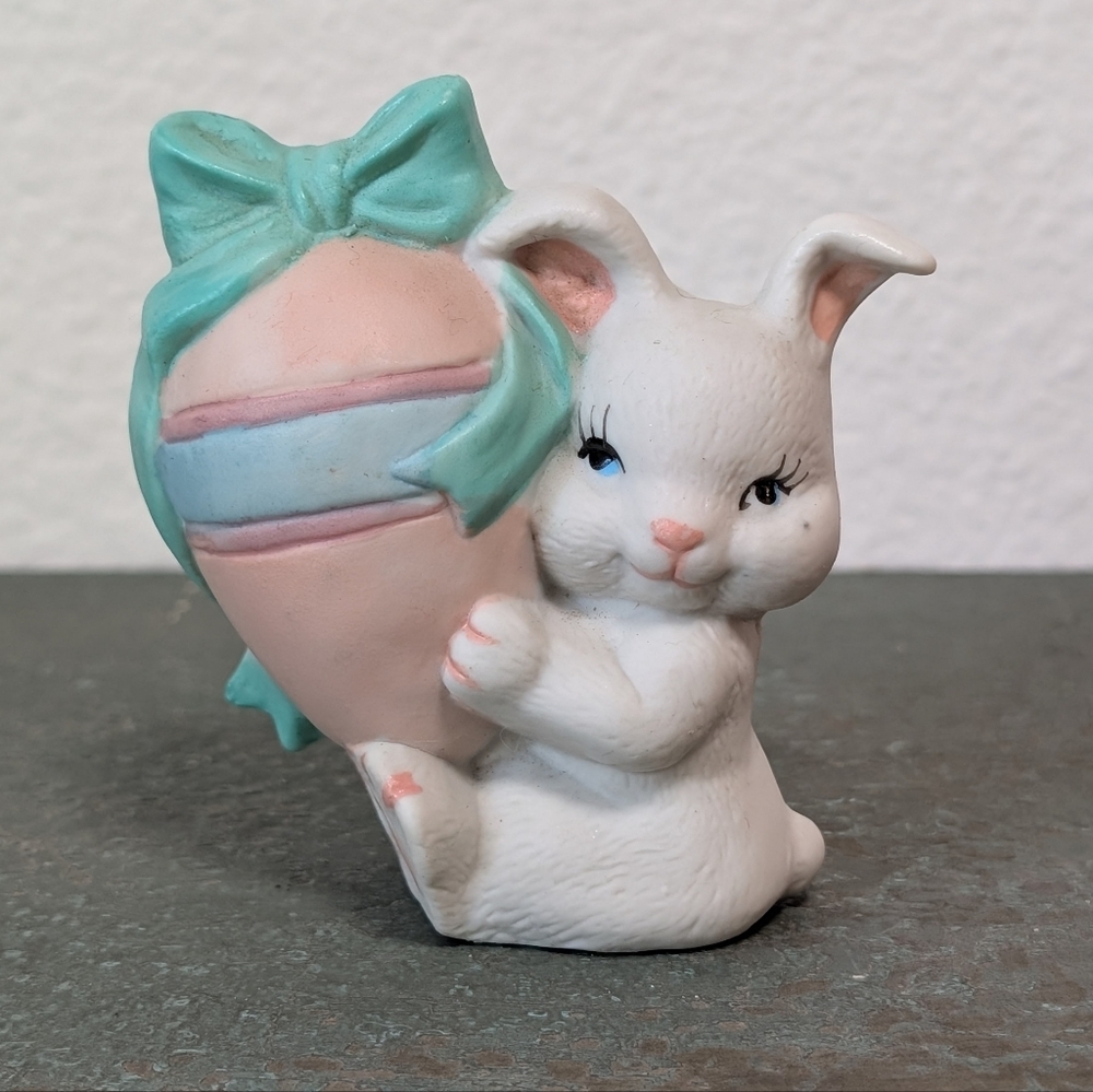 Easter Bunny Rabbit Girl Ceramic Figurine with Easter Egg and Bow Spring time